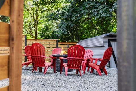 - Gather around the outdoor fire pit with cozy Adirondack chairs  
- Amazing spot for evening conversations under the stars  
- Relax in the backyard with a warm fire and fresh air