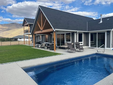 Private pool (open seasonally) with large covered concrete patio