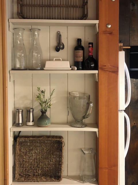 Kitchen built-in shelving displays a few of the many accouterments we supply.