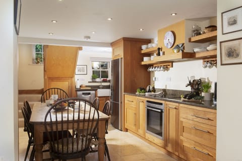 Deugh an Chy, Ground Floor: Enter the kitchen/dining space, fully equipped for an ideal self-catering getaway