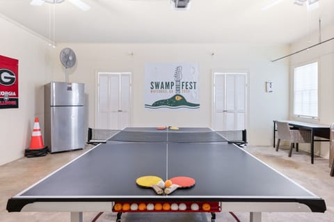 Pong and darts in the garage.