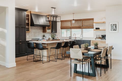 Fully stocked kitchen and island seating for 5.  The dining table offers additional seating.