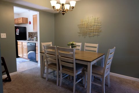 Dining room with seating for 6. High chair on premises