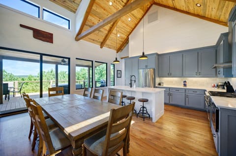 The formal dining area and kitchen.