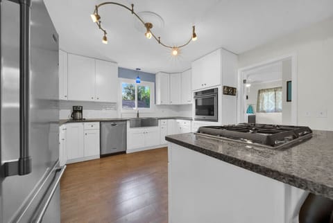 Enjoy spending time with family while preparing dinner at the island seating