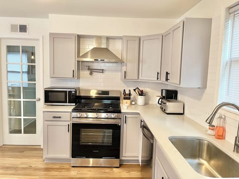 Large, open, fully-equipped chef's gourmet kitchen.