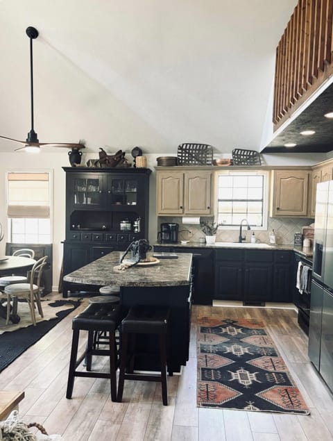 KITCHEN WITH FULL SIZE REFRIGERATOR, MICROWAVE, DISHWASHER, STOVE  & KUERIG