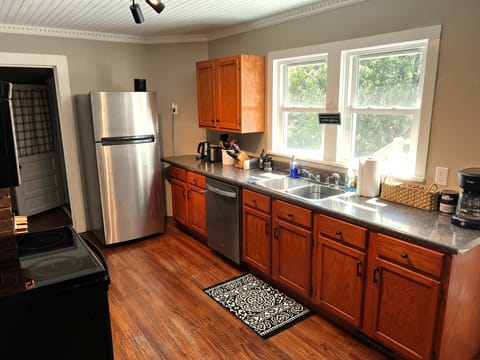 Kitchen with brand new dishwasher.