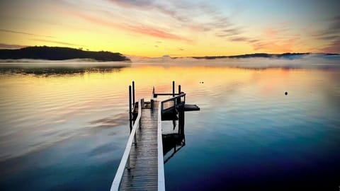 Wake up to this view of the water and mountains in the distance!