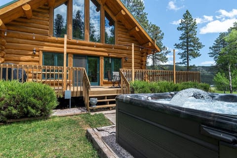 The hot tub features a stunning design that seamlessly blends with the patio`s aesthetic.