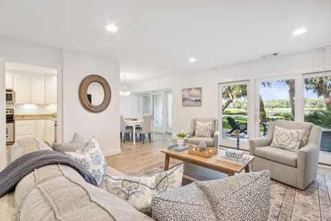 Relax in the Stunning Open Concept Living Area with Sliders to Private Patio and Flat Screen Smart TV (Queen Sleeper Sofa)