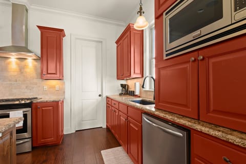 Fully stocked kitchen with island seating.