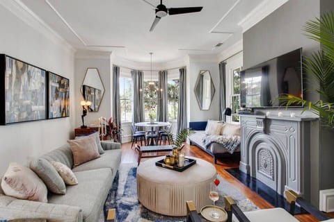 Living Room | Lounge Area with Fireplace and Ceiling Fan | Second Floor of Building — Unit on One Level