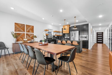 Gather around the custom live-edge table for meals, games, or conversation - all next to a fully equipped kitchen. seats the whole crew!
