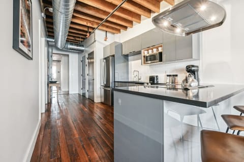 Prep snacks or share laughs in this industrial-inspired kitchen.