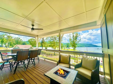 Private balcony with fire pit, outdoor dining table, & incredible view!