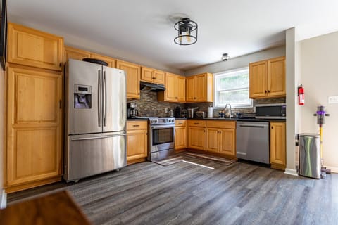 Spacious modern kitchen with stainless steel appliances, ample counter space, and everything you need for home-cooked meals