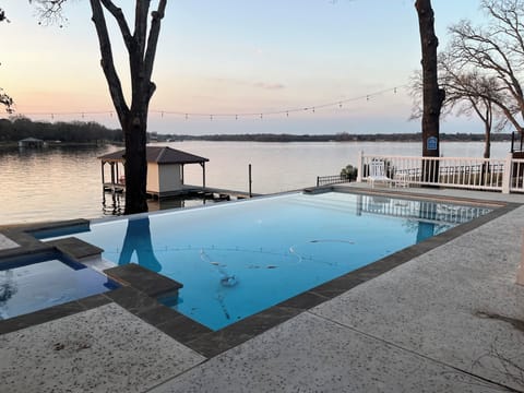 We are right on the lake (boat house pictured is our neighbors).