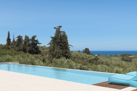 Poolside perfection meets relaxation, with stunning vistas all around.