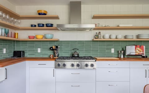 Stainless steel range with plenty of counter-space. 