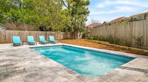 Your private pool awaits with comfortable loungers and tropical landscaping for perfect sunny afternoons.