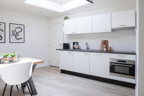 Relax in the inviting Bed en Koffie kitchen near Eindhoven Centrum sights.