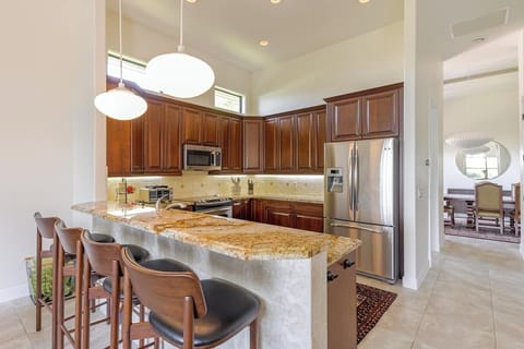 Kitchen with countertop seating.

