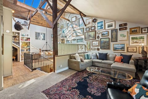 Spacious living room and library for multiple zones to hang out, relax and socialize