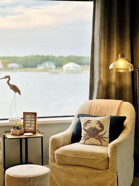 Spend your morning here! Coffee chairs by the lagoon window overlooking the lagoon! 