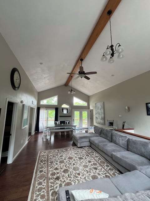 Great room entry see the lake and huge sectional sofa for you and your family!