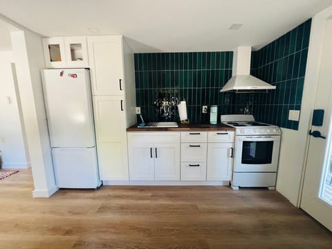 Brand new kitchen and appliances, fully stocked with pots, pans, dishware, ect