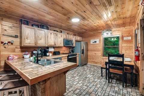 Fully equipped kitchen and dining area, with all the comforts of home.