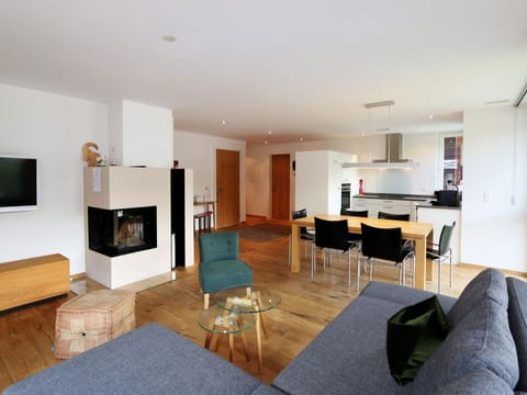 Property, Furniture, Television, Building, Table, Picture Frame, Wood, Interior Design, Chair, Flooring