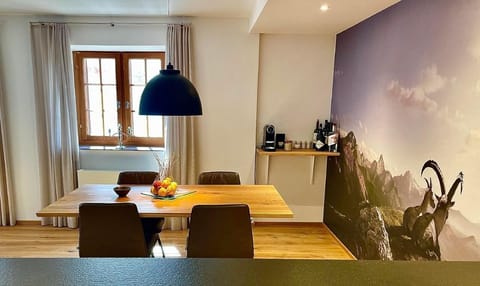 Dining area with Nespresso machine in casa M