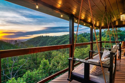 Relax and take in the serene surroundings on the inviting porch swings.