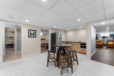 Kitchenette Area right when you walk in from outside.  The door to the left is the first bathroom, and the door to the right is the first bedroom. 