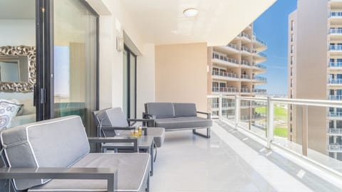 Comfortable cushioned furnishings on the balcony.