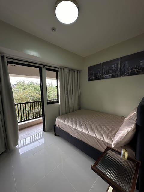 Sleep with our simple, high-end materials in the unit's bedroom. 