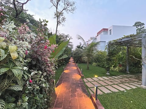 Earthy Pathway with stunning views on all sides leading upto the villa entrance