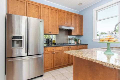 Cook up your favorites with our complete kitchen setup—featuring cookware, dishes, coffee maker, toaster, stove, oven, microwave, refrigerator, and more. 