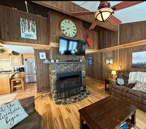 Relax by the stone fireplace — the heart of our home, where memories are made and stories are shared.