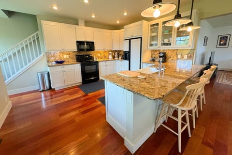 The kitchen is fully stocked and equipped with appliances and kitchen gadgets — it is a breeze preparing any meal.