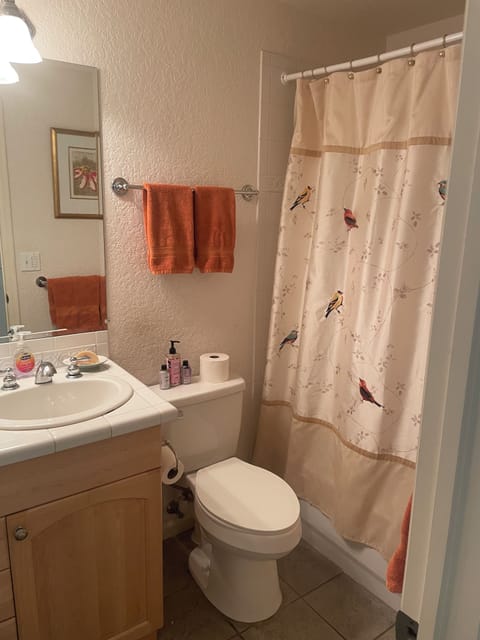 Full size bathroom with tub and shower...
