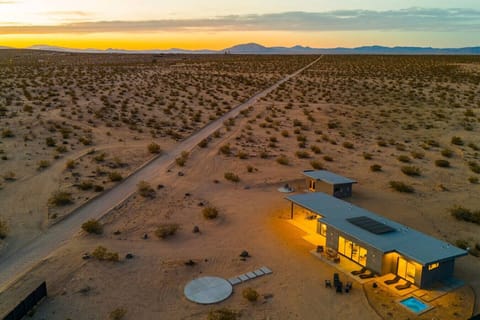 True desert solitude from above. Your own modern retreat, surrounded by nothing but wilderness, sky, and silence.