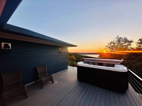 Hot tub that sits on deck from master bedroom 
