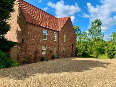 Large Gravel drive which is shared with Bainfield Lodge.