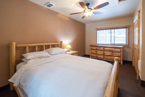 Northern Michigan themed furniture. Log queen sized bed, log dresser.