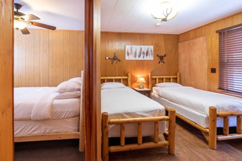 First bedroom with a full sized bed and seond bedroom with two twin beds.