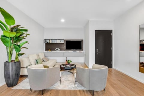 Settle in for movie nights with cozy seating and TV.