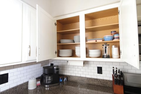 Plenty of flatware, as well as plastic dishes and dishes for the littles as well